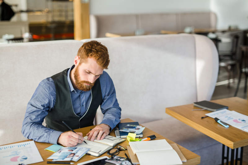 5 Passive Income Ideas for Small Business Owners in 2025: Boost Your Revenue with Ease 9 Owner brainstorming how to start best passive income for small business 2025.